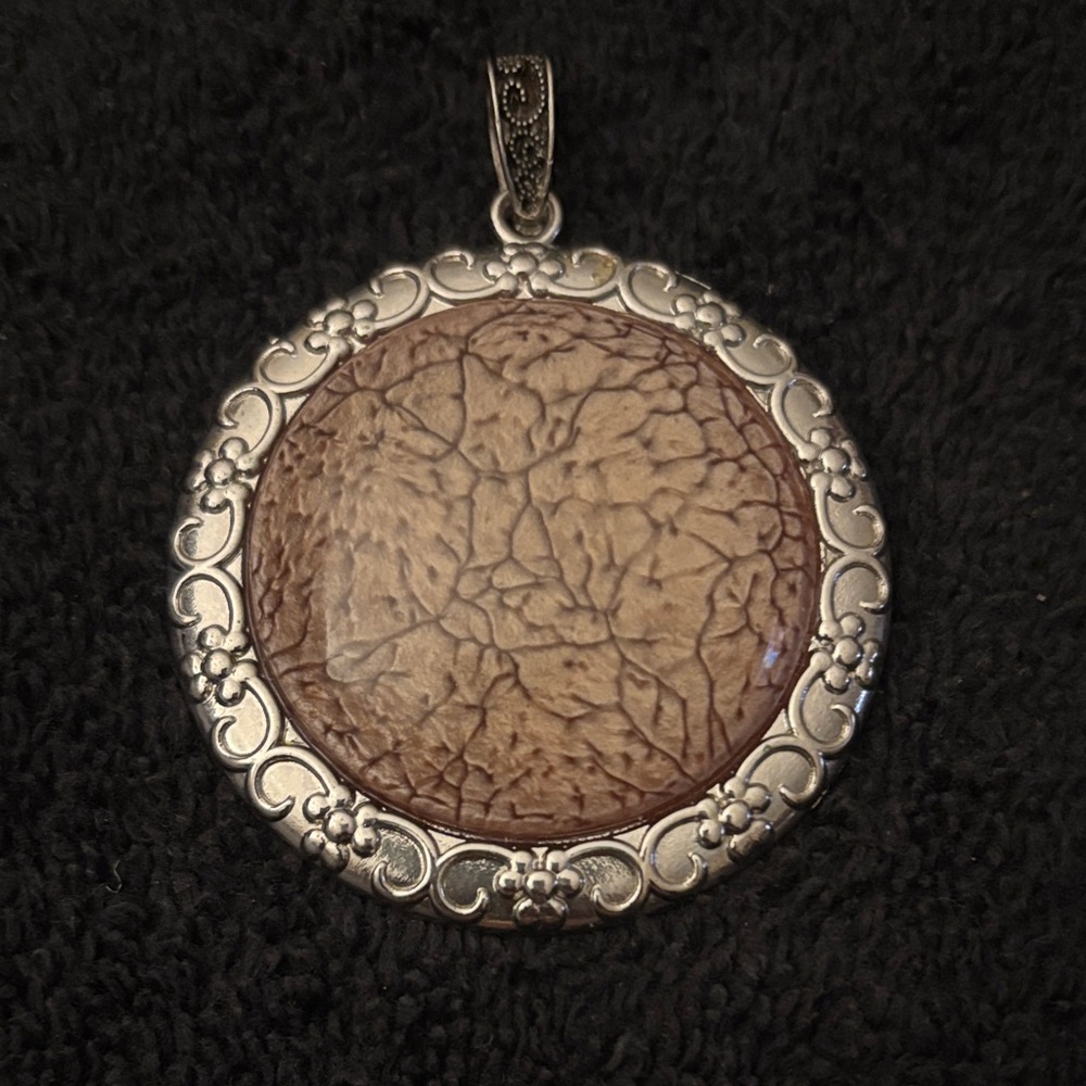 Elegant Silver and Brown Pendant